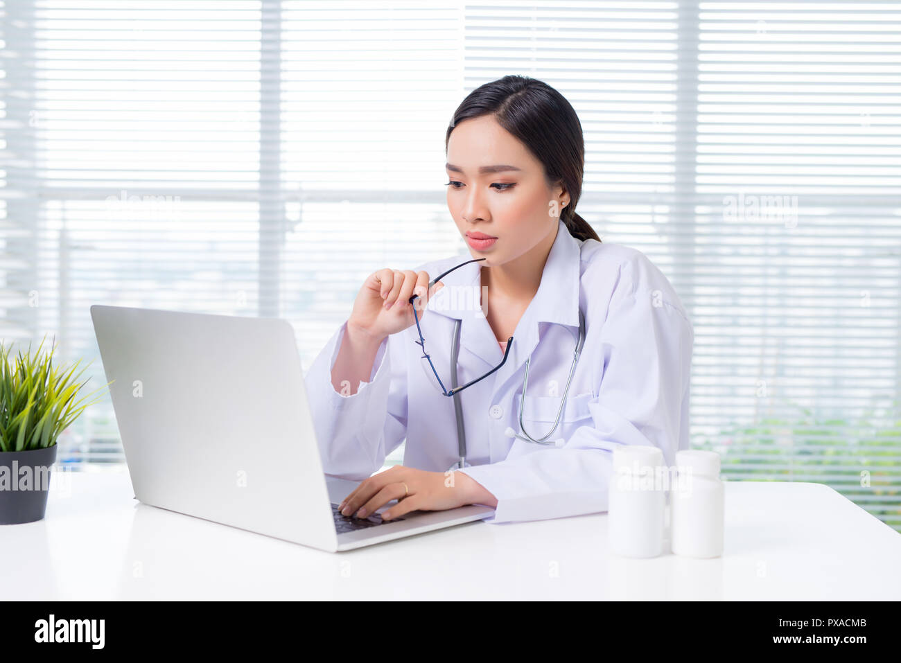 Portrait happy asian female doctor hi-res stock photography and images ...