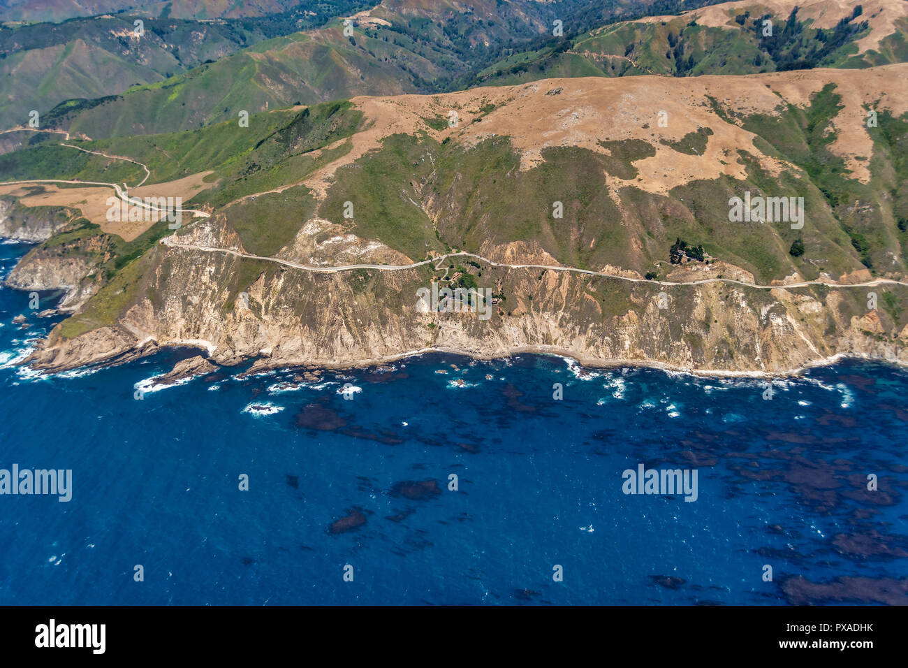 Highway 1 in Big Sur, California, seen from the plane on a sunny day. Stock Photo