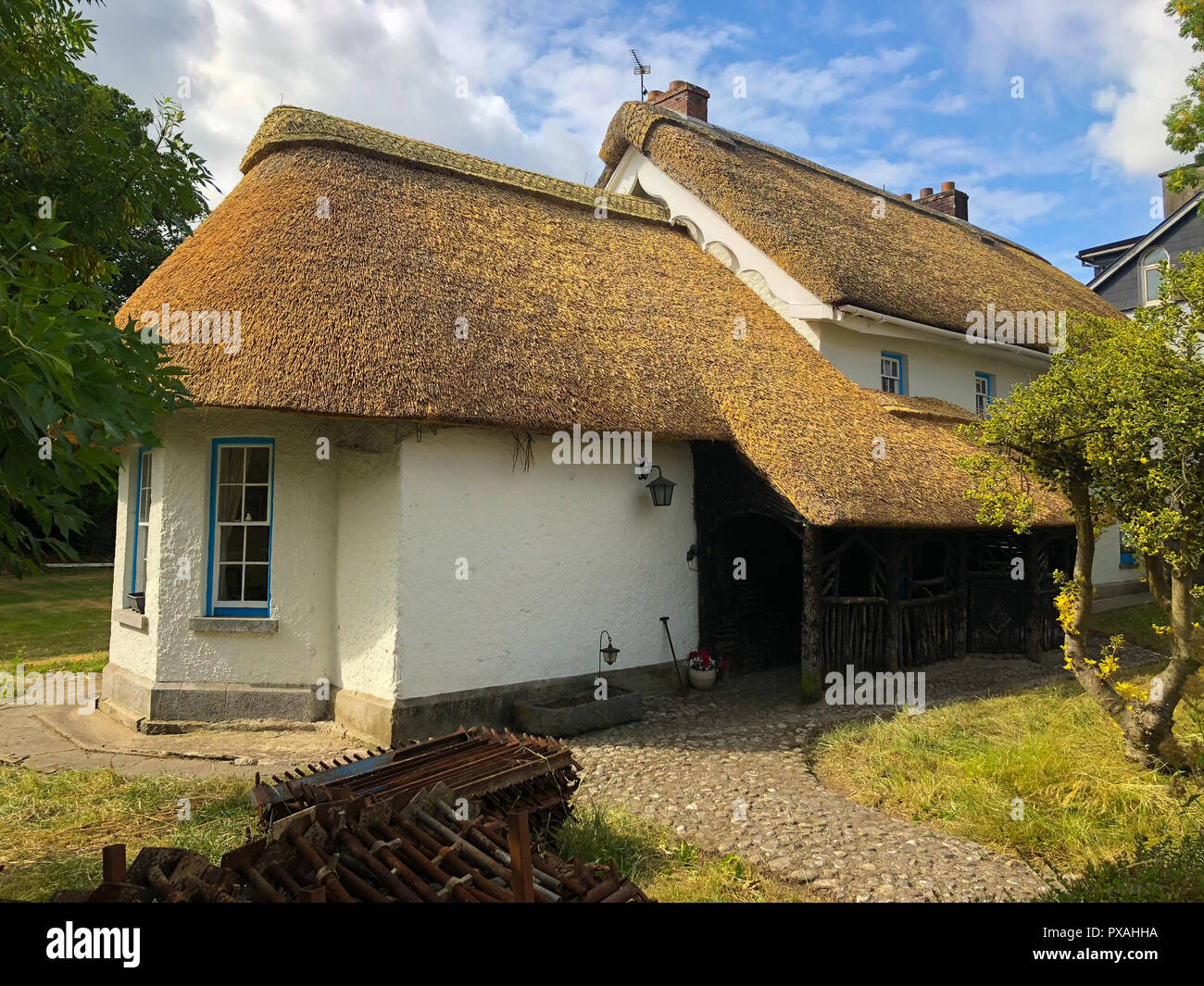 Adare, Ireland - 13 July,2018: Adare is a small village in County Limerick, Ireland,Architectural forms include the thatched cottages near the entranc Stock Photo