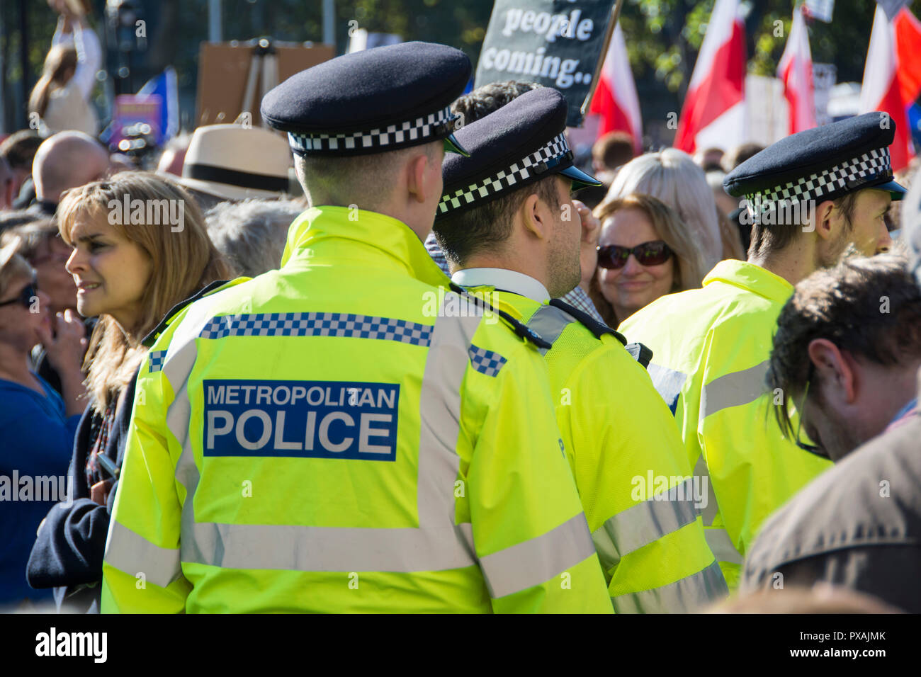 Policemen (Bobbies) on the beat in Parliament Square, Westminster, London, UK Stock Photo