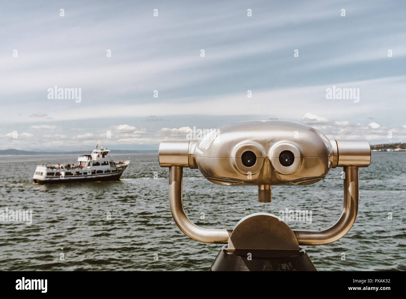 Close-up of a viewing machine or binoculars on the Seattle waterfront along Elliott Bay, Washington state, USA. Stock Photo