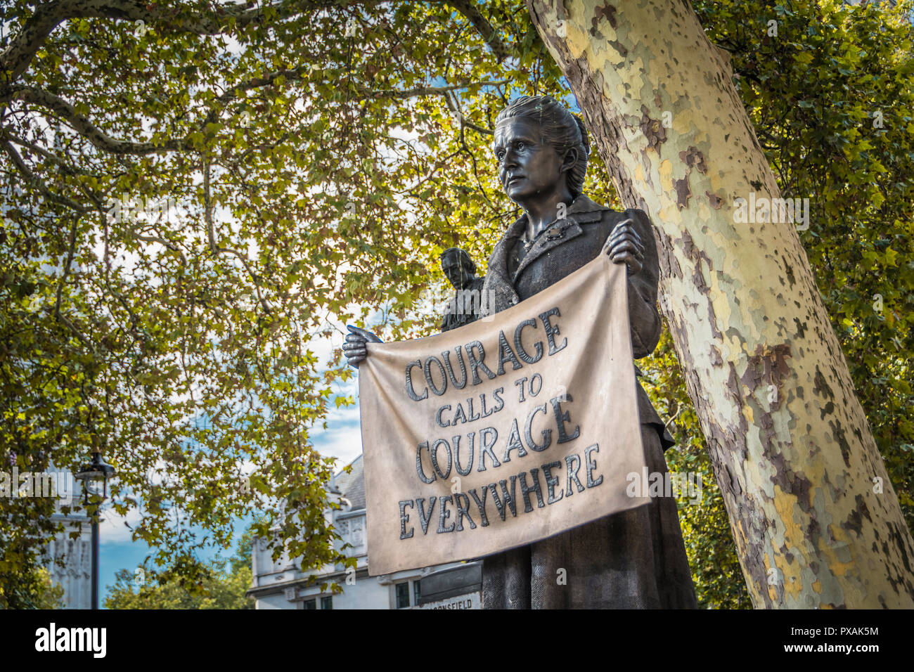 'Courage calls to courage everywhere'  - Gillian Wearing’s bronze statue of Millicent Fawcett in Parliament Square, London, England, U.K. Stock Photo