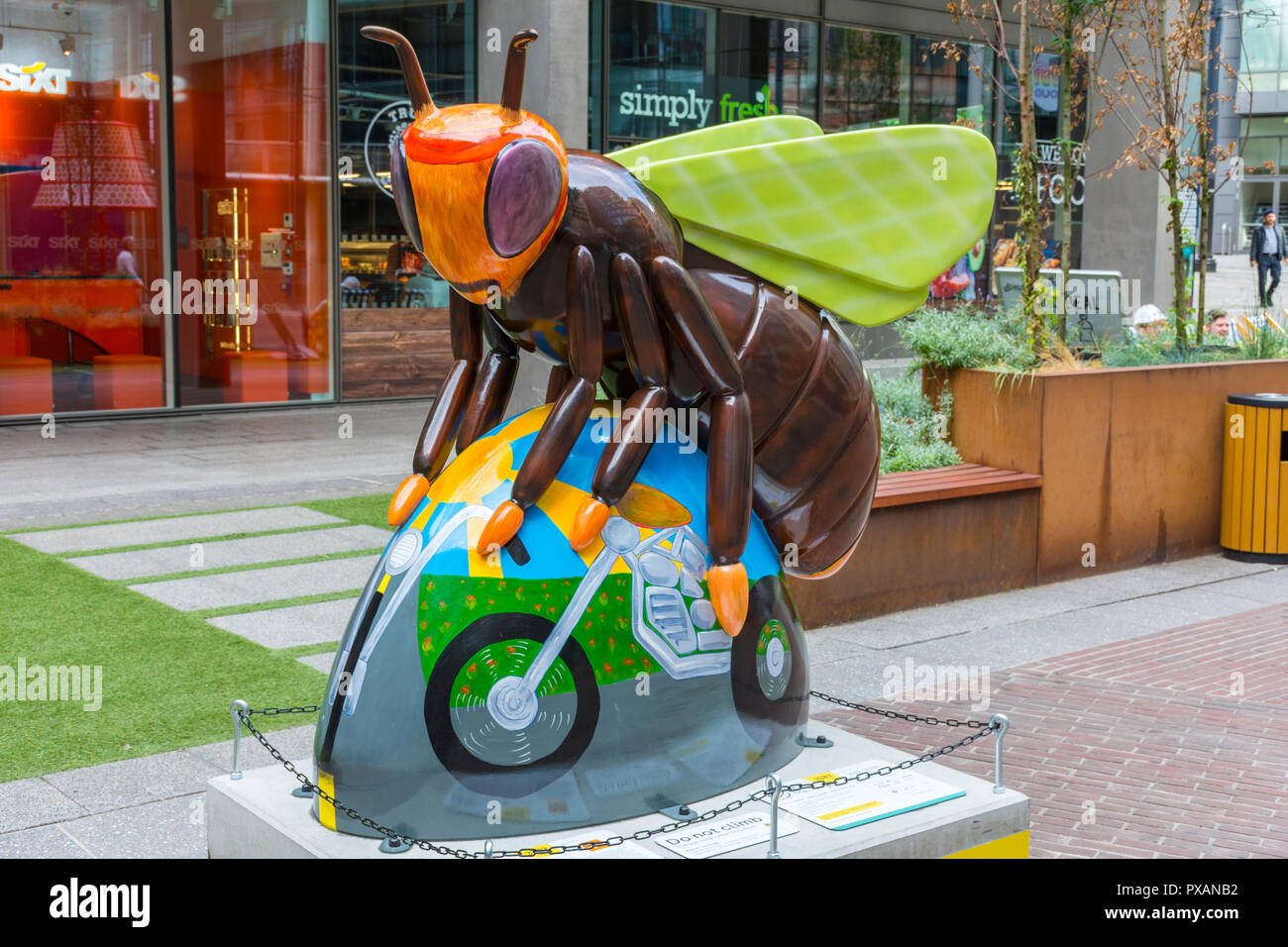 Bee-sy Rider, by Anne-Marie Byrne.  One of the Bee in the City sculptures, Piccadilly Place, Manchester, UK. Stock Photo