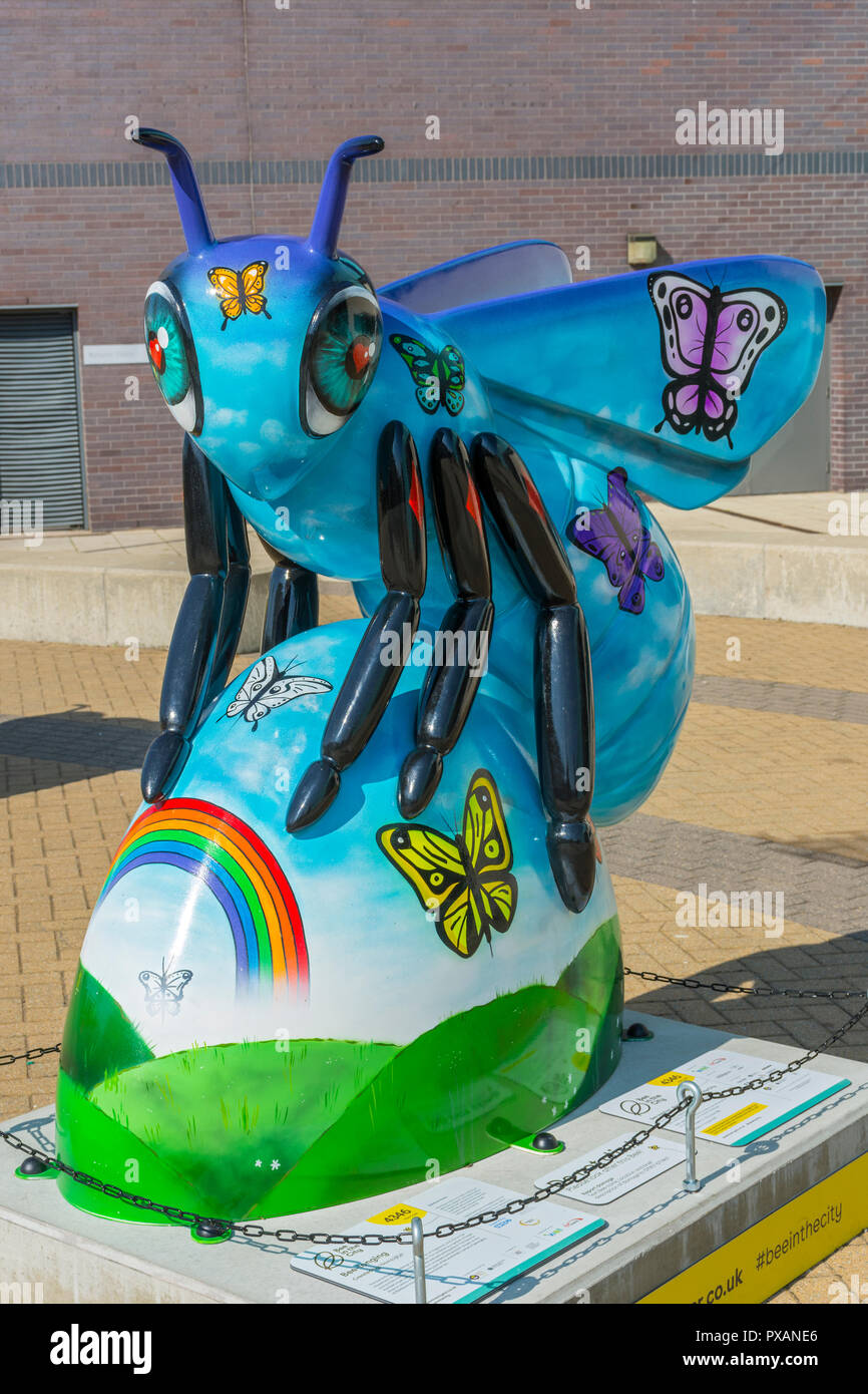 Bee-longing, by Neequaye.  One of the Bee in the City sculptures, National Squash Centre, Etihad Campus, Manchester, UK. Stock Photo