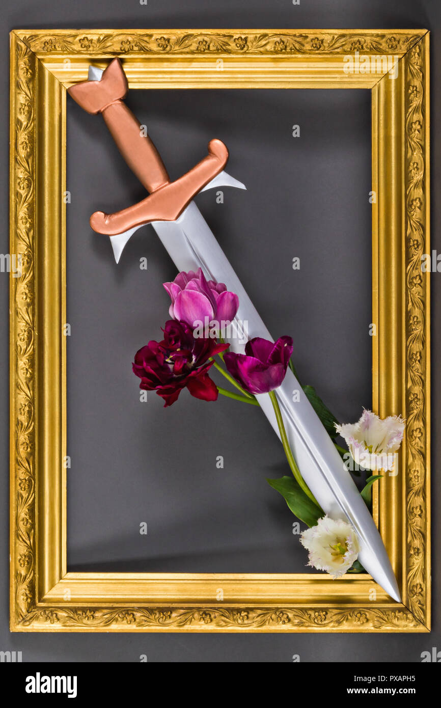 Steel Sword With Bronze Hilt And Tulip Flowers In Gold Baguette Frame Medieval Symbol Of Aristocracy And Nobility Stock Photo Alamy Steel Sword With Bronze Hilt And Tulip Flowers In Gold Baguette Frame Medieval Symbol Of Aristocracy And Nobility Stock Photo Alamy