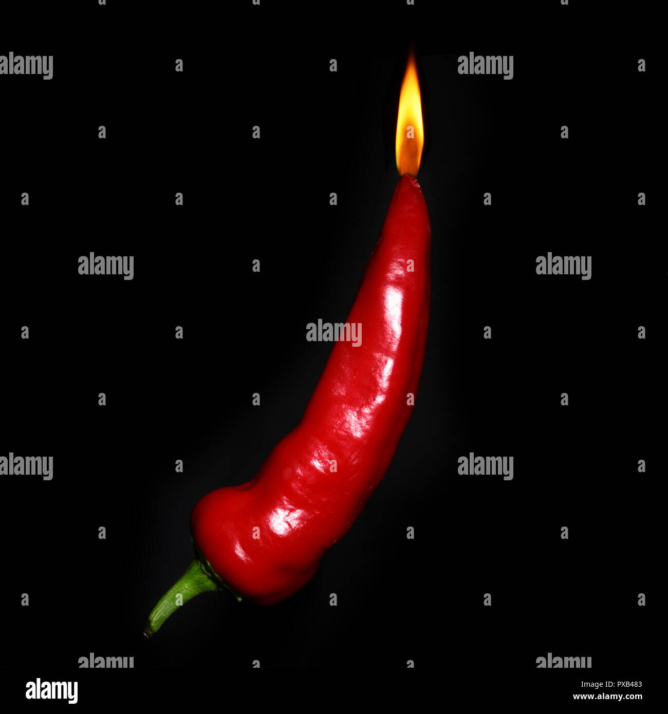 red chili pepper hot as a lighter. concept Stock Photo Alamy
