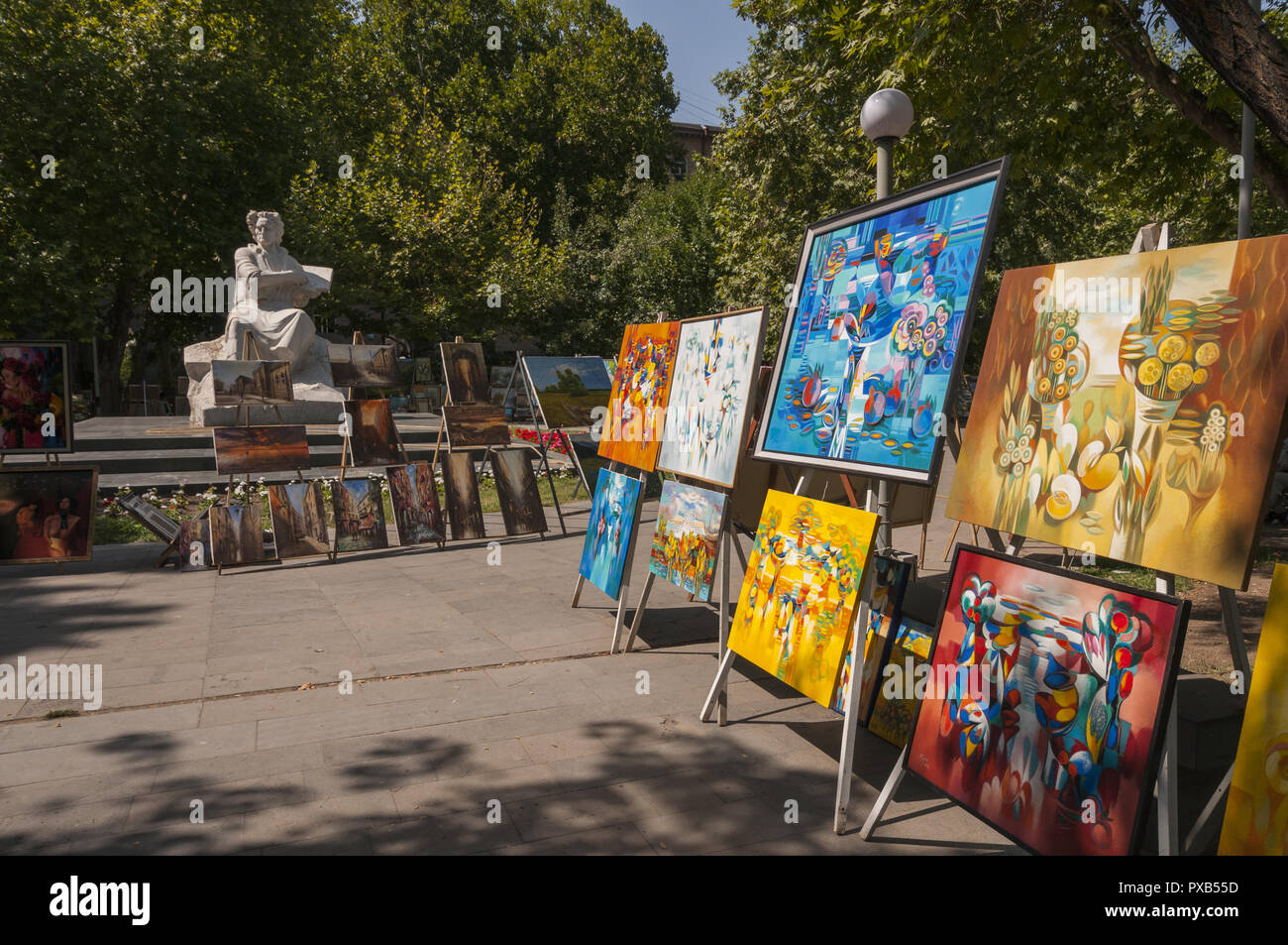 Armenia, Yerevan, Freedom Square, Swan Lake, Armenian art vendors with Martiros Sarian statue