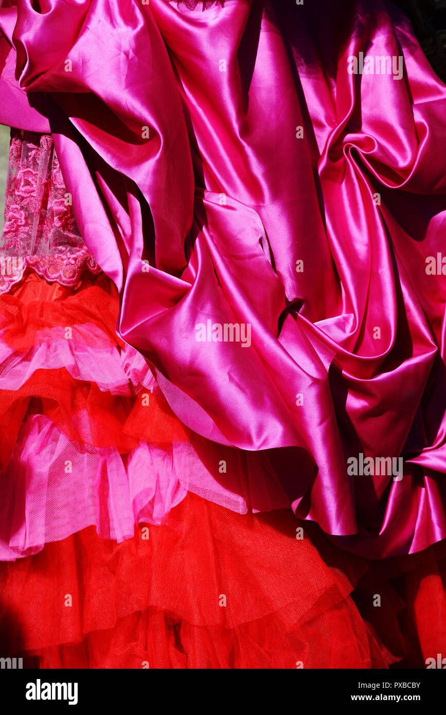 drape of crimson fabric and lace, background Stock Photo