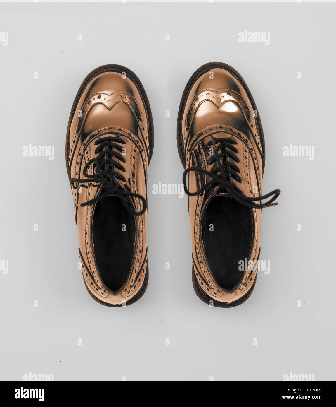 copper metallic women budapester shoes isolated on white grey background Stock Photo