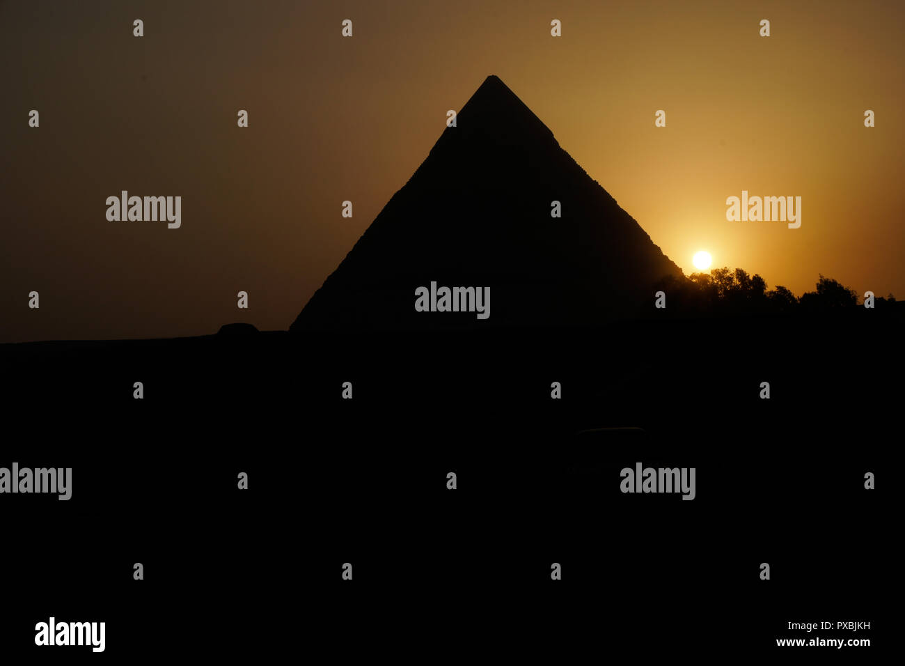 sunset at the Pyramids of Giza Stock Photo - Alamy