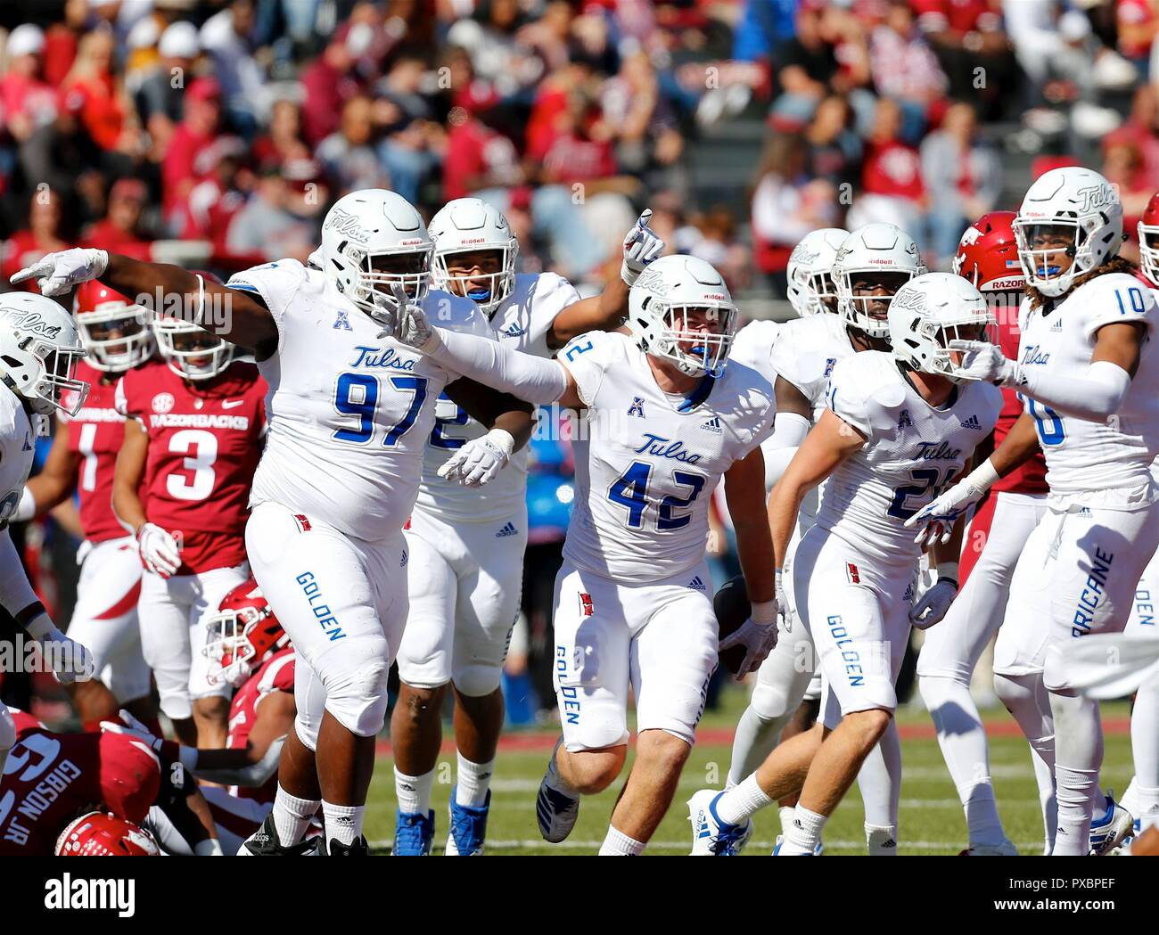 Oct 20, 2018: Tulsa defense members Tyarise Stevenson #97, Cooper Edmiston #42, Zaven Collins #23 and Manny Bunch #10 celebrate following a fumble recovery. Arkansas defeated Tulsa 23-0 at Donald W. Reynolds Stadium in Fayetteville, AR, Richey Miller/CSM Stock Photo