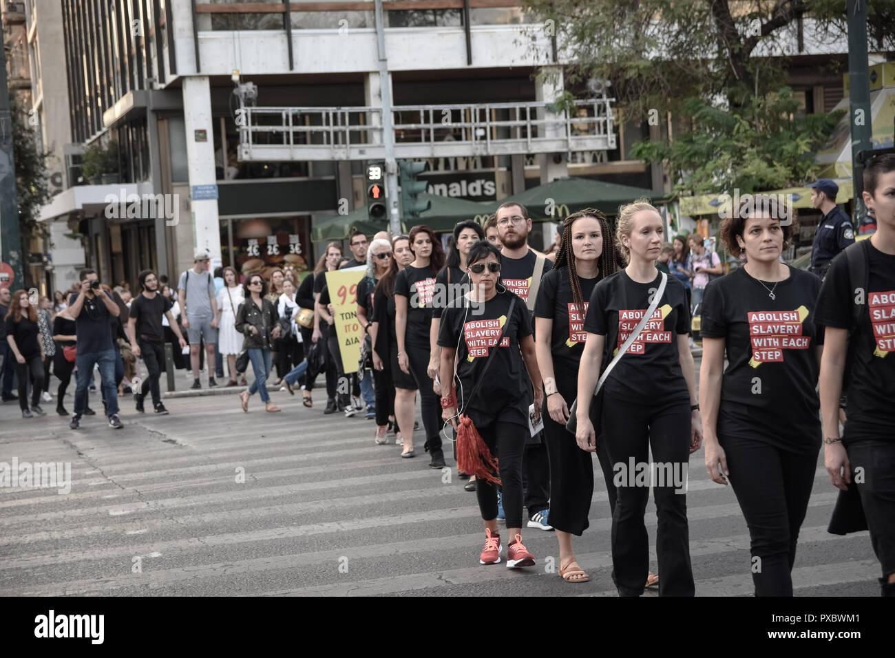 Athens, Greece. 20th Oct, 2018. Participants are seen in black shirts walking during the 5th Walk for Freedom 2018 in Athens, an event that aims to spread awareness about human trafficking and to let people know that slavery still exists. Credit: SOPA Images Limited/Alamy Live News Stock Photo