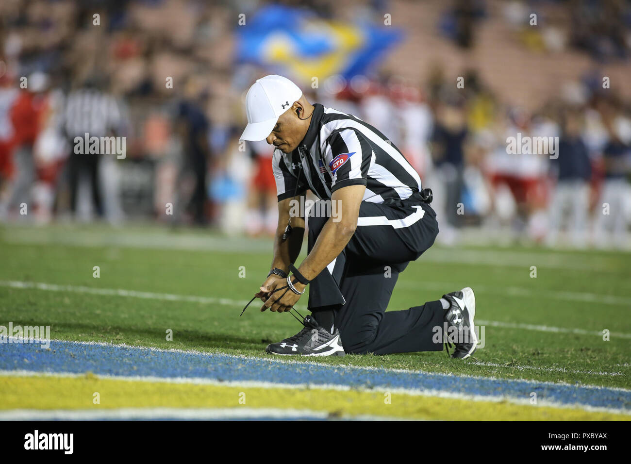 Pasadena CA. 20th Oct, 2018. Referee Jay Edwards tying his Under Armour  shoes during the Arizona Wildcats vs UCLA Bruins at the Rose Bowl in  Pasadena, Ca. on October 20, 2018 (Photo