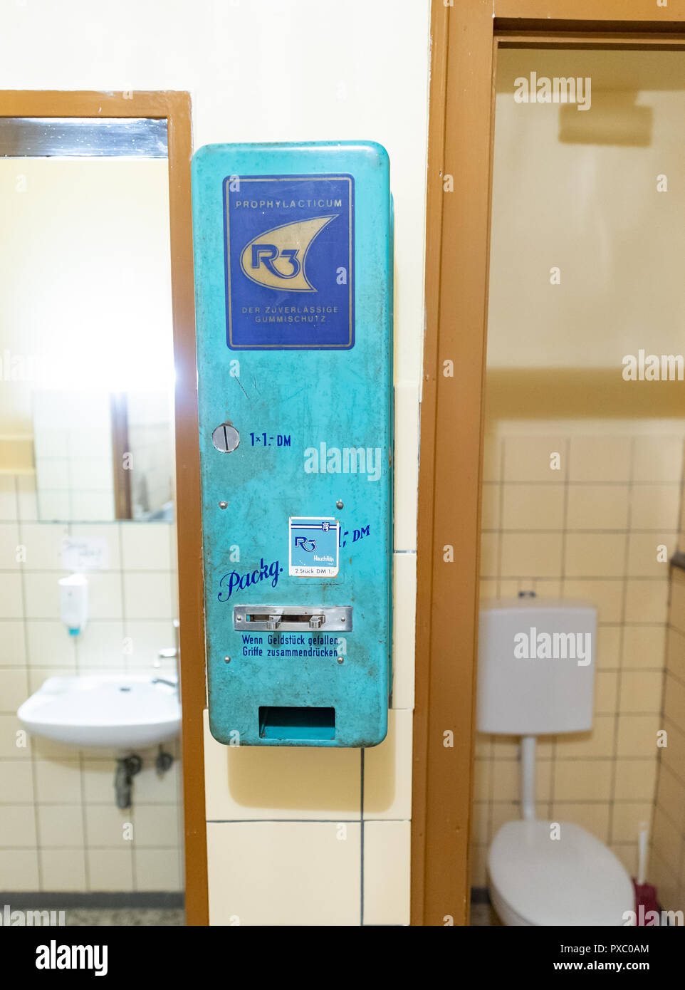 condom dispenser in bathrooms