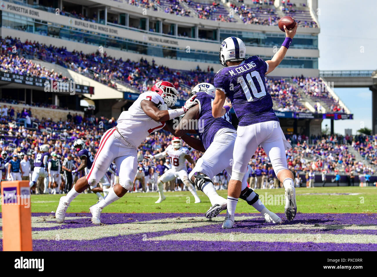 December 31, 2022 Michigan Wolverines wide receiver A.J. Henning #3 carries  the ball and is tackled by TCU Horned Frogs linebacker Dee Winters #13  during the semi-final playoff football game between the