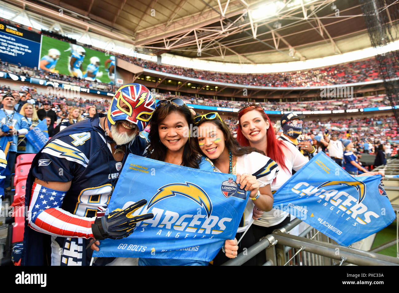 Tennessee Titans' Dion Lewis (left) tries to get away from LA Chargers'  Jatavis Brown during the International Series NFL match at Wembley Stadium,  London. PRESS ASSOCIATION Photo. Picture date: Sunday October 21