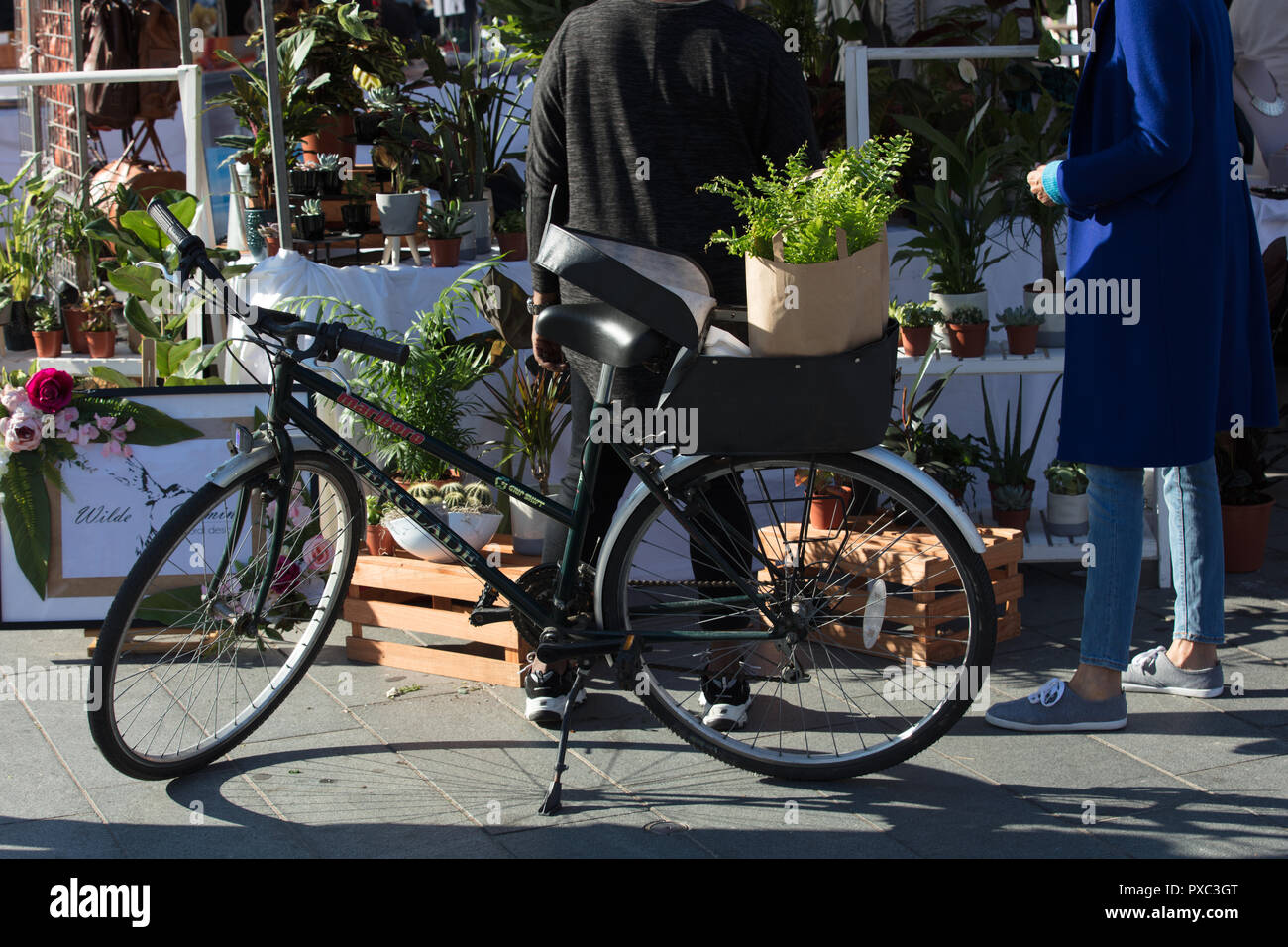 London, UK. 21st October 2018. Bicylce with a basket seen on Woolwich Market.  Credit: Joe Kuis / Alamy Live News Stock Photo