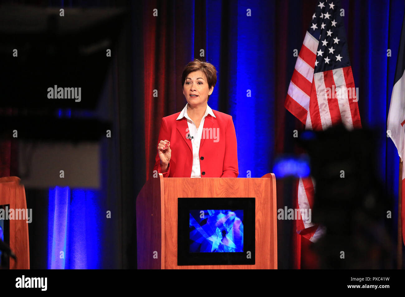 Davenport, Iowa, USA. 21st Oct, 2018. Iowa Governor Kim Reynolds responds to a question during the last of three debates Sunday morning, October 21, 2018 in the KWQC studios in Davenport, Iowa. Credit: Kevin E. Schmidt/Quad-City Times/ZUMA Wire/Alamy Live News Stock Photo