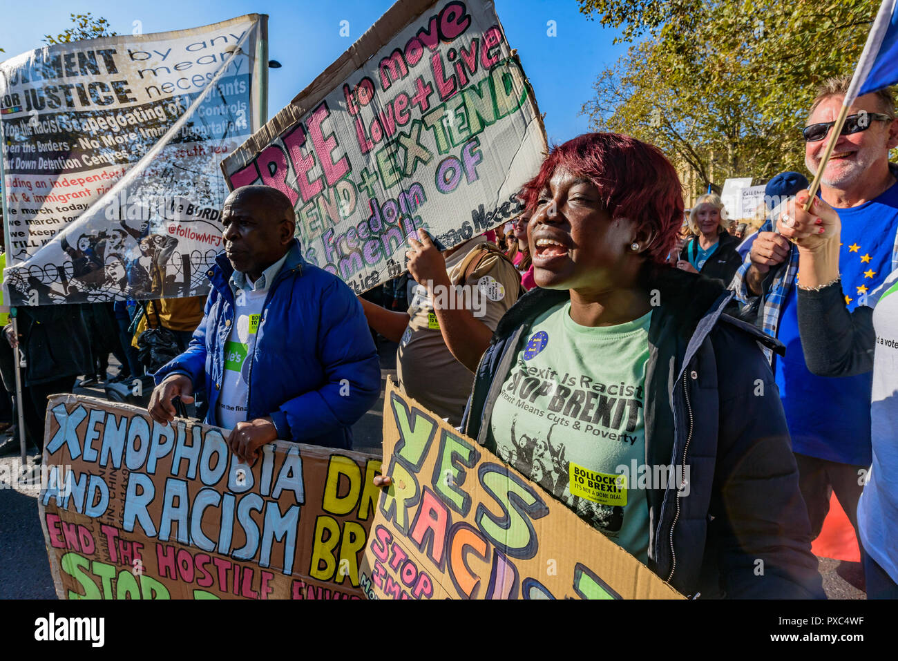 London, UK. 20th Oct 2018.  Movement for Justice protested on Piccadilly in front of the People's Vote March calling for an end to Brexit, which they is racist. They want an end to the scapegoating of immigrants and call for an end to the hostile environment which is ripping families apart, and amnesty for all those present here and to an extension of freedom of movement to include the Commonwealth. Credit: ZUMA Press, Inc./Alamy Live News Stock Photo