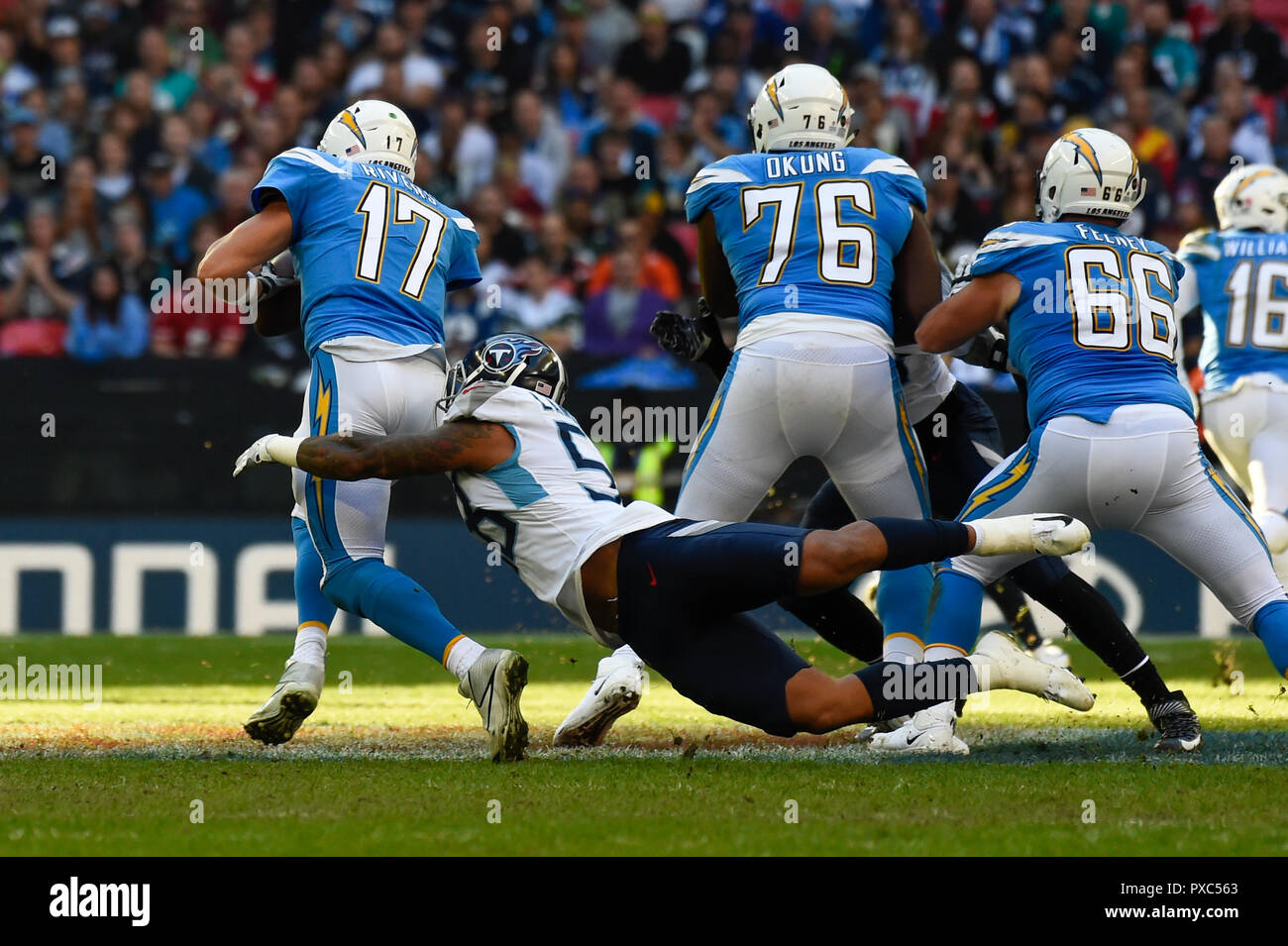 London, UK.  21 October 2018. Quarterback Philip Rivers (17) of The Chargers is tackled. Tennessee Titans at Los Angeles Chargers NFL game at Wembley Stadium, the second of the NFL London 2018 games. Final score - Chargers 20 Titans 19.  Credit: Stephen Chung / Alamy Live News Stock Photo