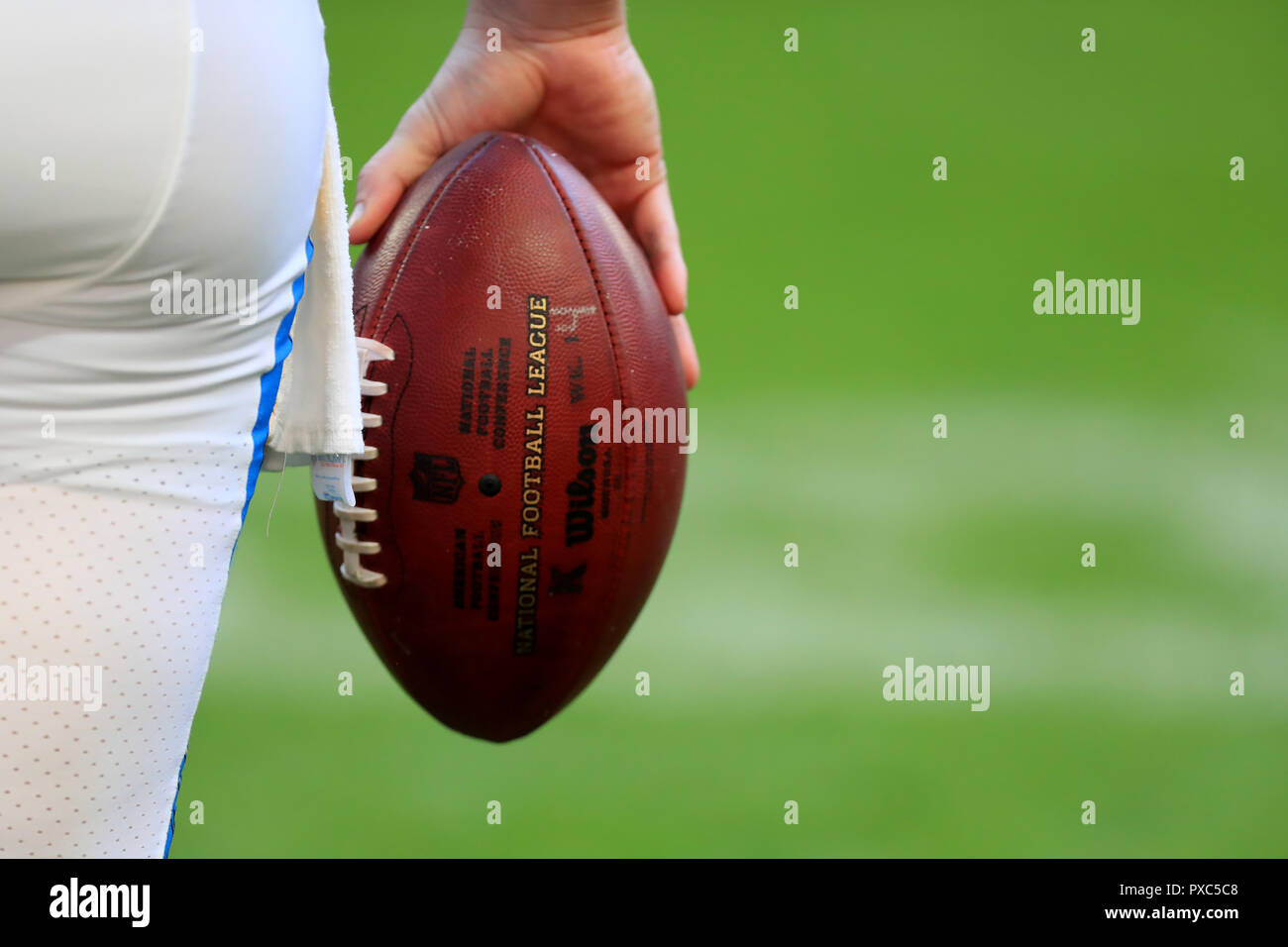 Wembley Stadium, London, UK. 21st Oct, 2018. NFL in London, game two, Tennessee Titans versus Los Angeles Chargers; Philip Rivers of the Los Angeles Chargers holds the match ball Credit: Action Plus Sports/Alamy Live News Stock Photo