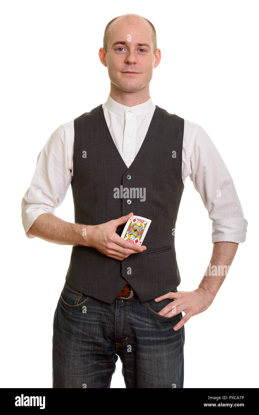 Bald Caucasian magician man holding Jack of Diamonds card with h Stock Photo