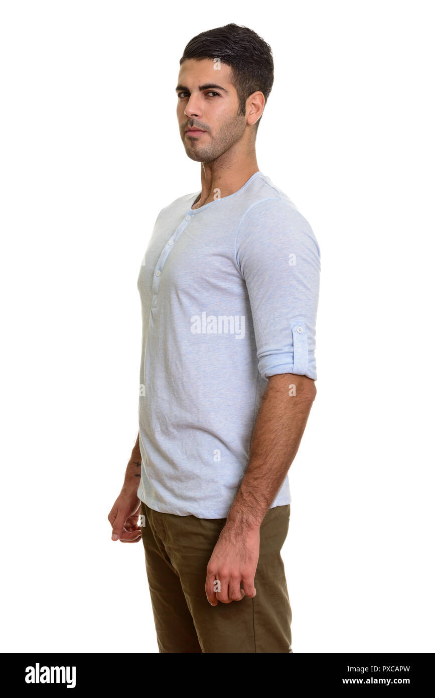 Handsome serious man standing hi-res stock photography and images - Alamy