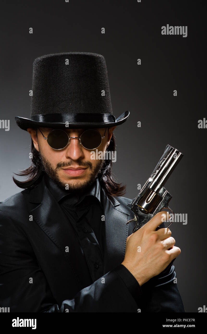 Vintage concept with man wearing black top hat Stock Photo - Alamy