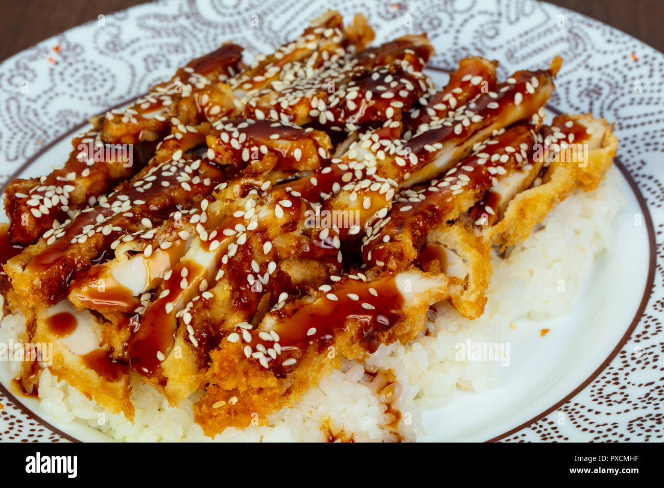 Chicken tempura with rice and teriyaki sauce Stock Photo Alamy