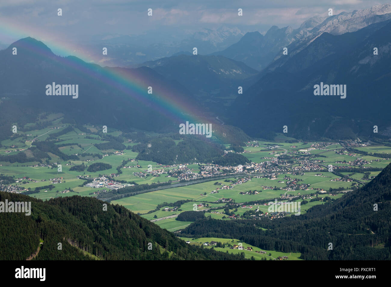 View of the Salzach valley in Austria with rainbow over Golling an der Salzach from the Rossfeld Panoramic Road, Bavaria, Germany Stock Photo