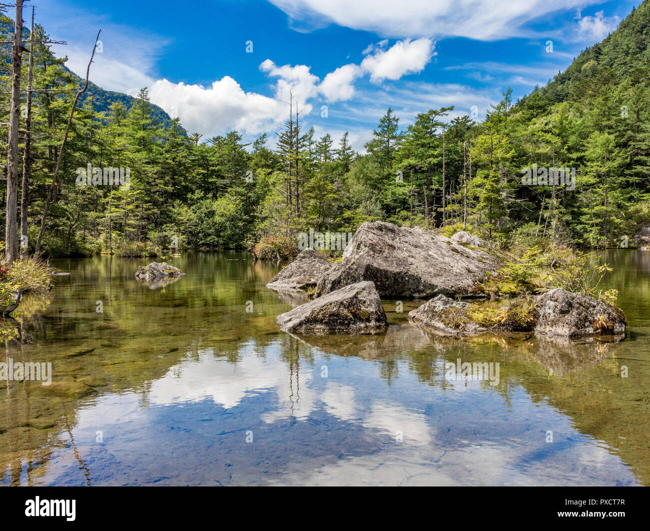 Pond in Japanese mountains, Kamikochi, Japan Stock Photo Alamy