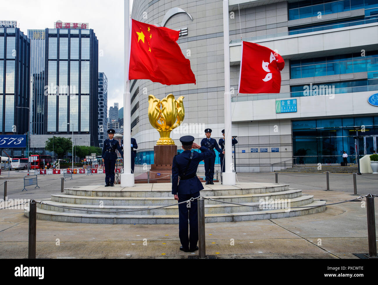 Hong Kong - August 9, 2018: Soldiers performing China and Hong Kong flag rising ceremony at the Golden Bauhinia Square Stock Photo