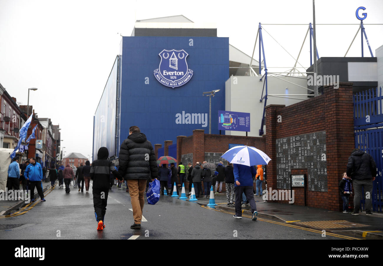 Fans make their way to the ground for the Premier League match at Goodison Park, Liverpool. Stock Photo