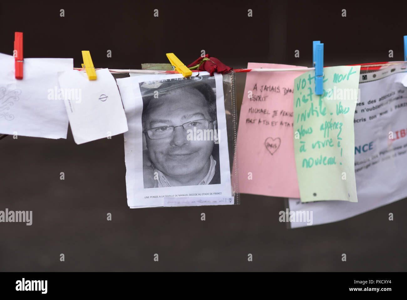 November 22, 2015 - Paris, France: People pay tribute to the victims of the November 13 terror attacks with candles, drawings, street arts, and pictures of the dead with impromptu memorial near the Bataclan, the Carillon bar, the Petit Cambodge restaurant, place de la Republique. Des photos des victimes des attaques terroristes du 13 novembre 2015 dans un memorial improvise. *** FRANCE OUT / NO SALES TO FRENCH MEDIA *** Stock Photo