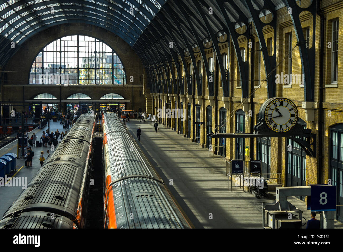 View of the main platforms at King's Cross station with trains and