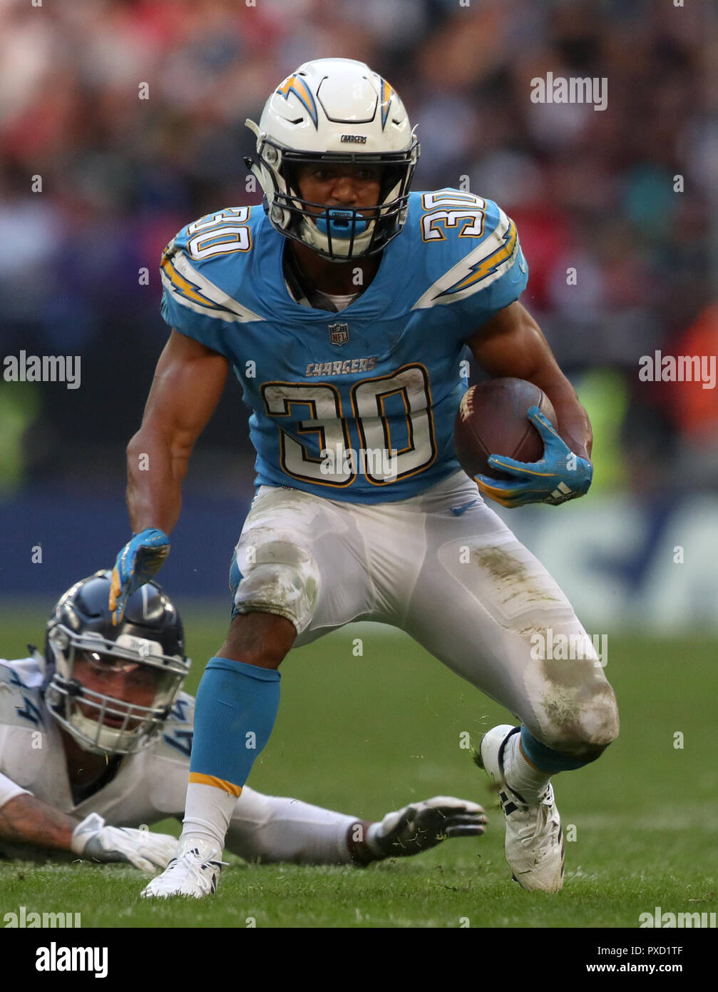 LA Chargers's Austin Ekeler in action during the International Series NFL match at Wembley Stadium, London. PRESS ASSOCIATION Photo. Picture date: Sunday October 21, 2018. See PA story GRIDIRON London. Photo credit should read: Simon Cooper/PA Wire. Stock Photo