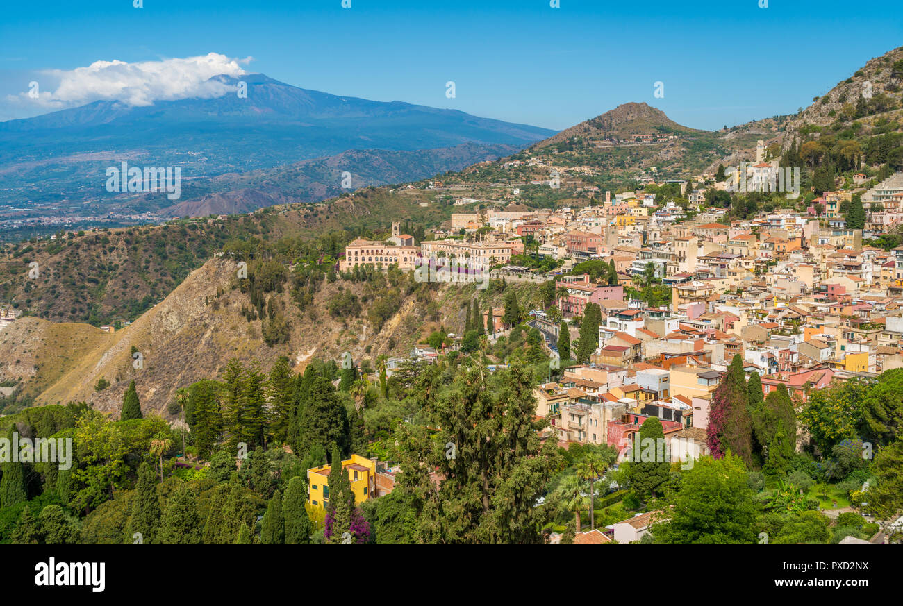 Panoramic sight with Taormina and Etna volcano, from the Ancient Greek Theater. Province of Messina, Sicily, southern Italy. Stock Photo