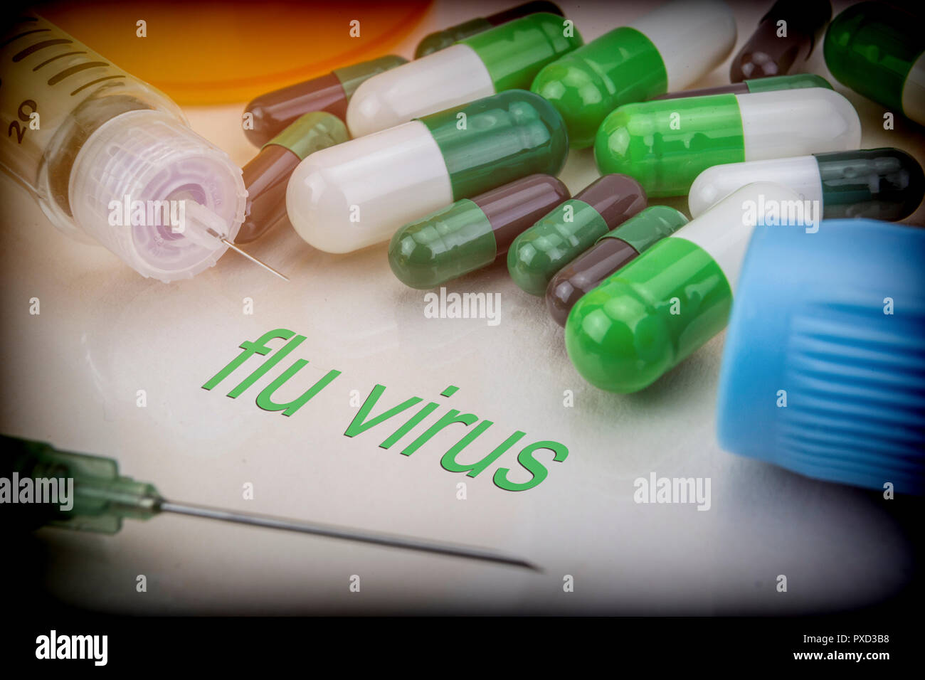 Flu virus, medicines and syringes as concept of ordinary treatment health Stock Photo