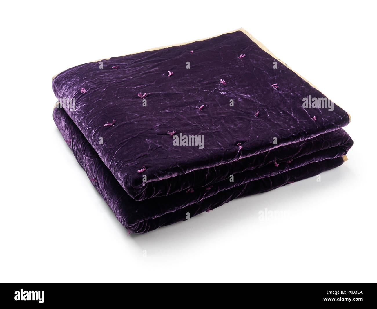 Purple blanket made of velor fabric, neatly folded, isolated on white background Stock Photo