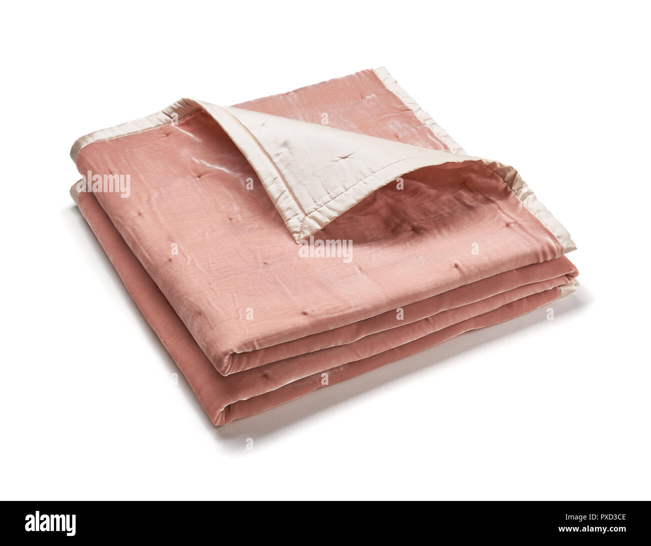 Pink blanket made of velor fabric, neatly folded, isolated on white background Stock Photo