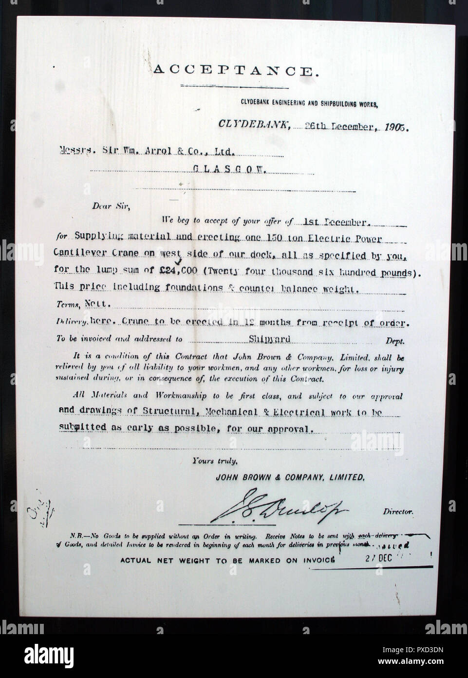 A copy of the original contract between John Brown, shipbuilders, and Wm Arrol, engineers, to build the Titan crane on the banks of the River Clyde in Clydebank for the sum of £24,600. A bargain, and it is still standing as a tourist attraction today. Stock Photo
