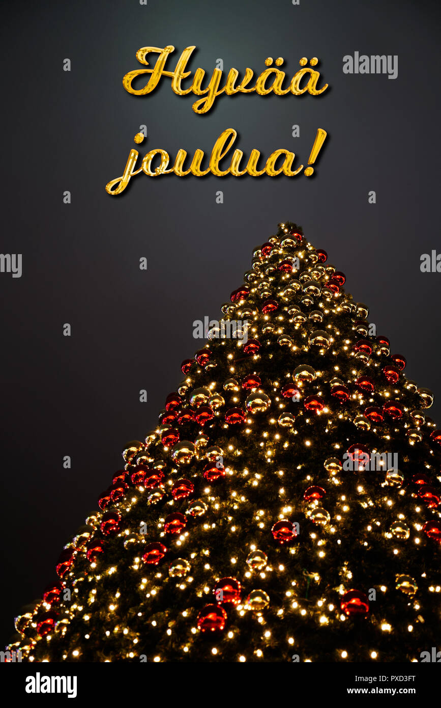 A Christmas Tree With Golden And Red Decoration The Finnish Text Hyvaa Joulua Means Merry Christmas The Perfect Holiday Greeting Card Stock Photo Alamy