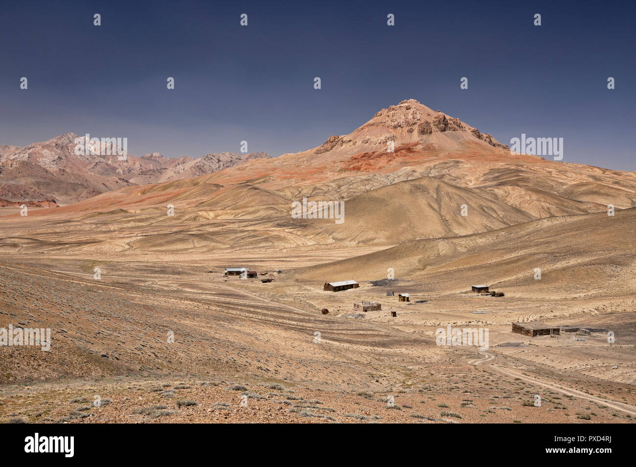 Russian ghost town at base of retired Soviet Shorbuloq Observatory east of Murghab, Murghab District, Pamir Mountains, Gorno Badakhshan, Tajikistan Stock Photo