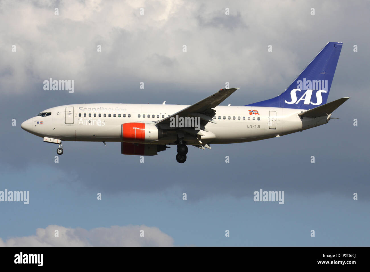 Scandinavian Airlines SAS Boeing 737-700 with registration LN-TUI on short final for runway 01 of Brussels Airport. Stock Photo
