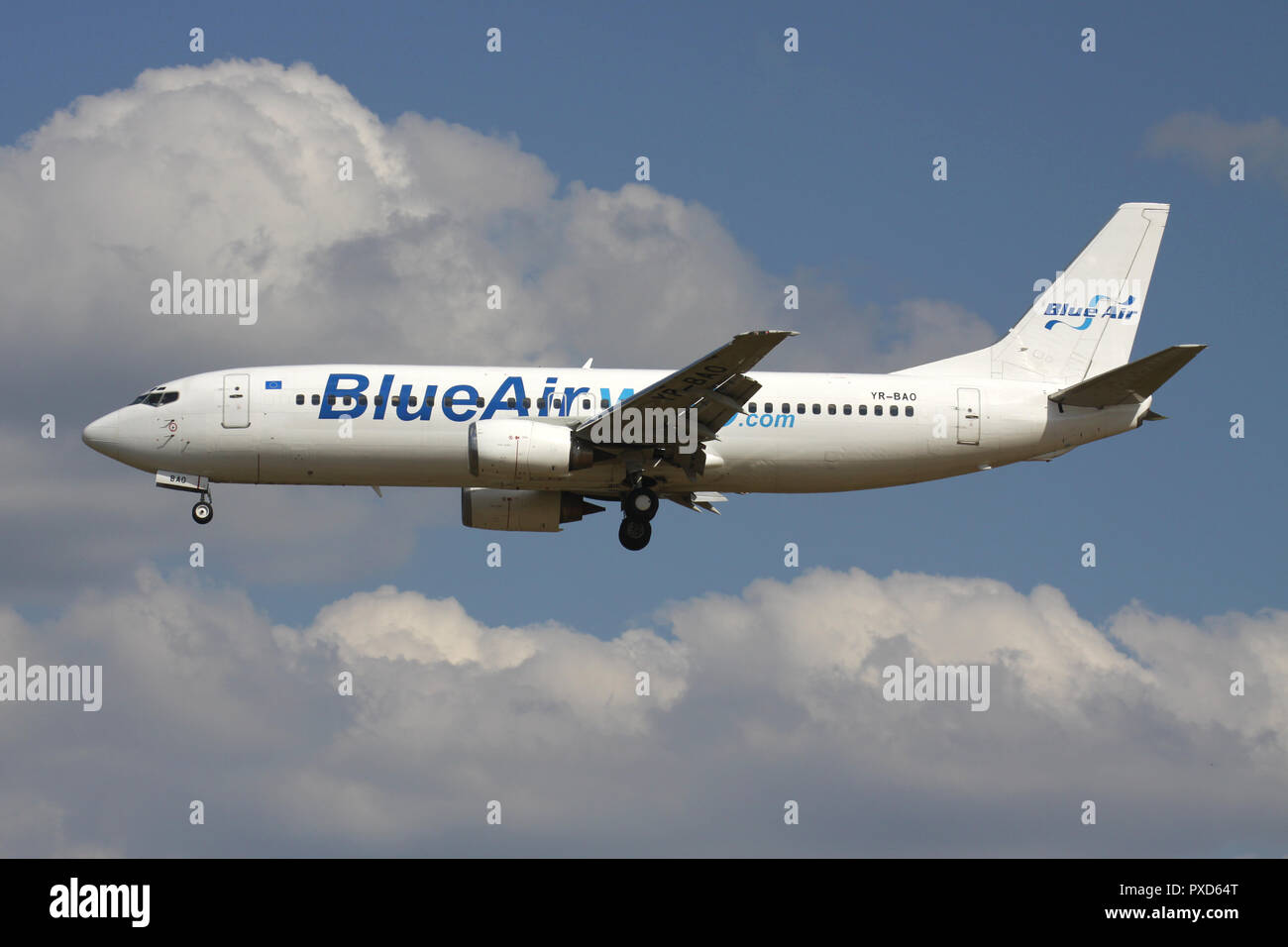 Romanian Blue Air Boeing 737-400 in white BlueAirweb livery with registration YR-BAO on short final for runway 01 of Brussels Airport. Stock Photo
