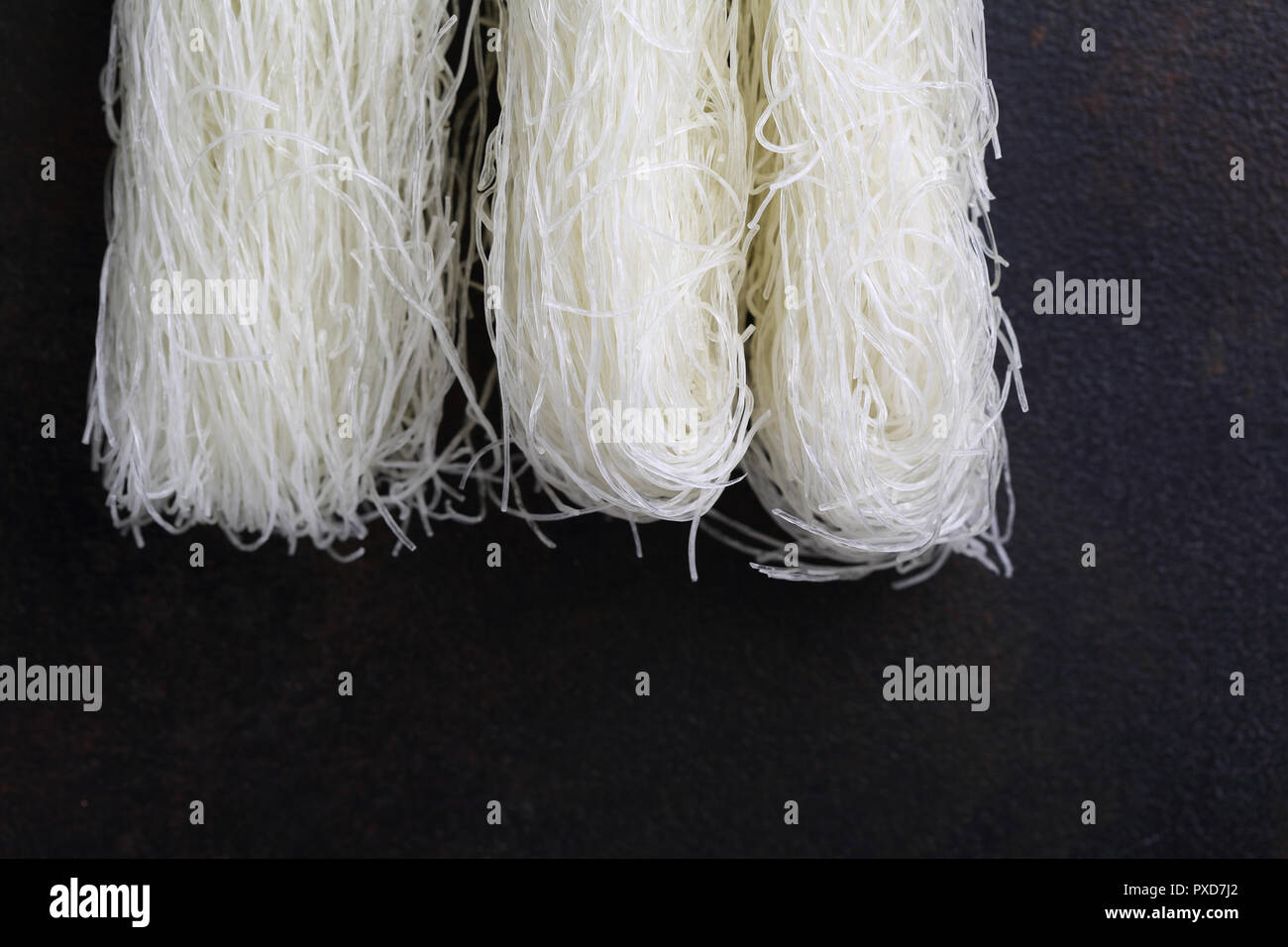 Uncooked rice noodles Stock Photo Alamy