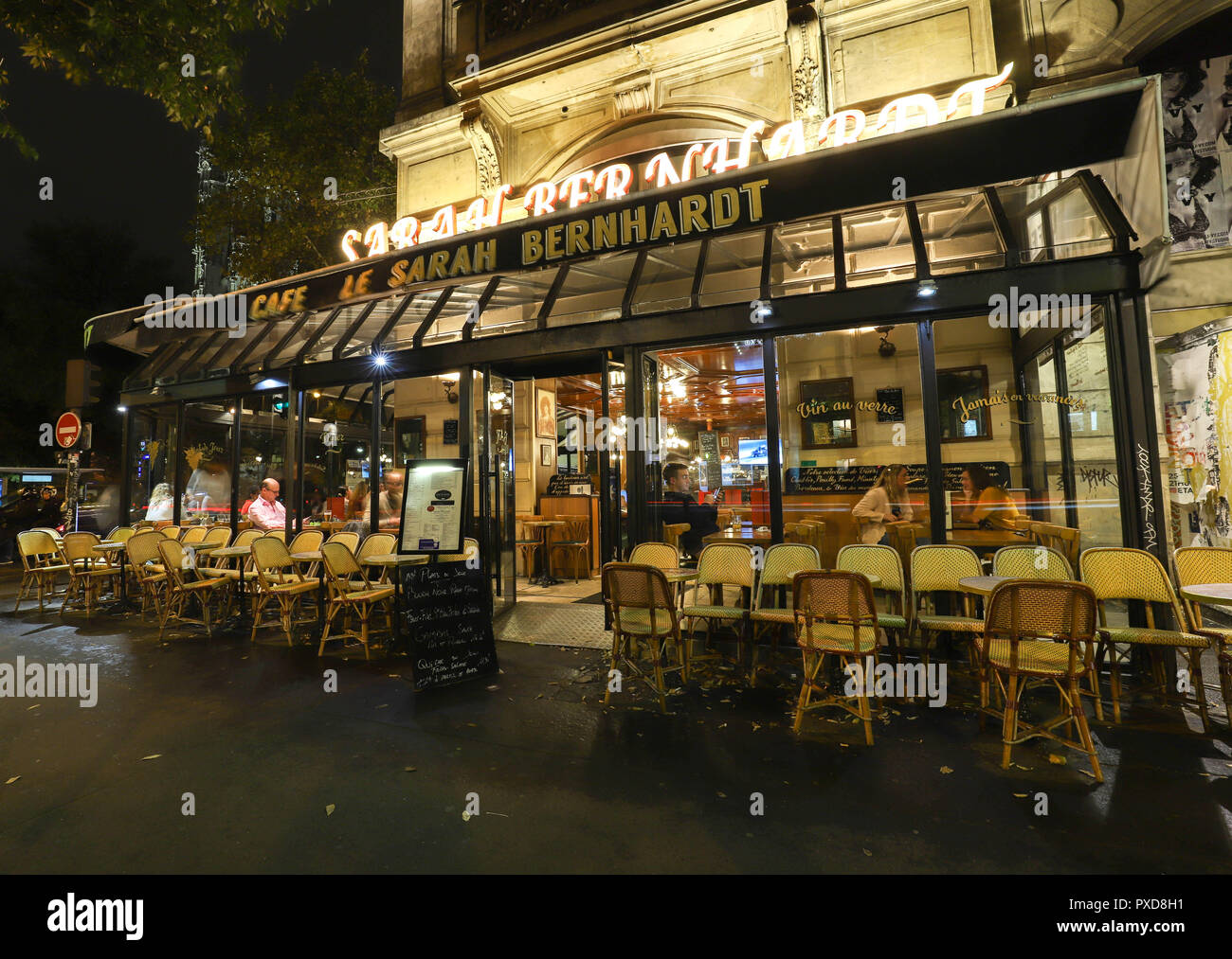 The famous French cafe Sarah Bernardt at night , Paris, France Stock ...
