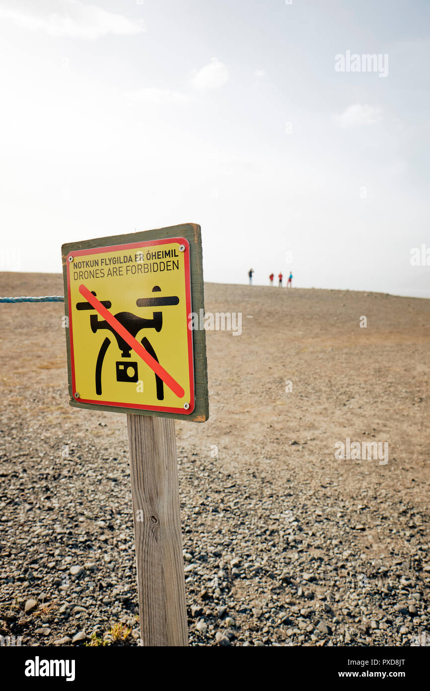 A no drone flying sign at a popular tourist destination in Iceland. Stock Photo