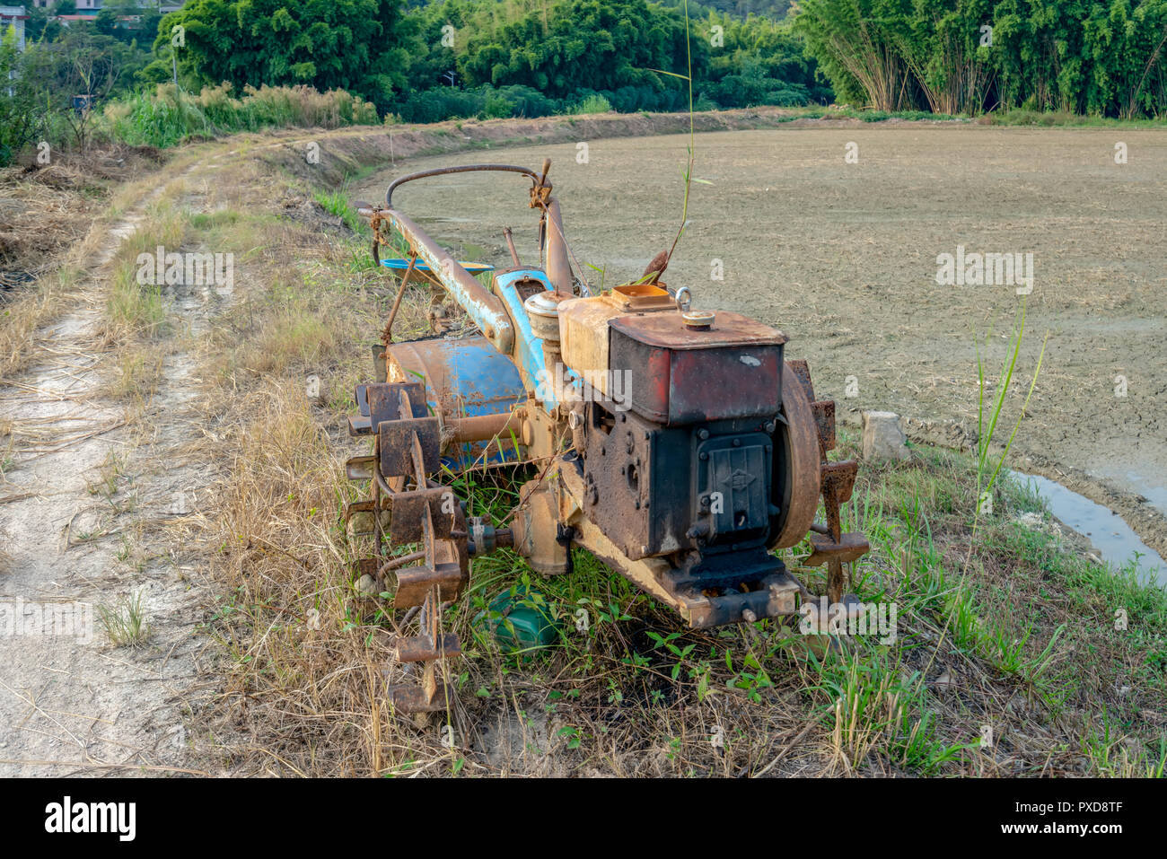 old tractor in field Stock Photo - Alamy