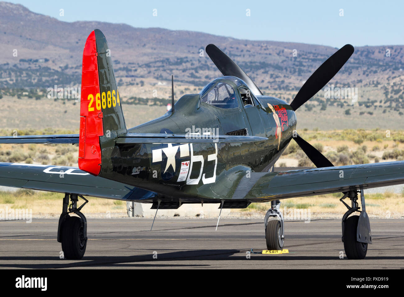 A rare P-63 King Cobra and Unlimted Air Racer 'Pretty Polly' on the ramp prior to a heat race at the 2018 Reno National Championship Air Races. Stock Photo